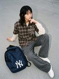 DAXUEN brown plaid faux-layered button-up shirt — model photo