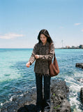 DAXUEN plaid oversized distressed long-sleeve shirt — model photo