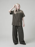 DAXUEN Distressed plaid short sleeve collared shirt — model photo