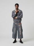 DAXUEN Distressed plaid wide-leg cargo pants — model photo