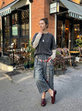 DAXUEN Distressed plaid wide-leg cargo pants — model photo
