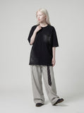 DAXUEN Oversized distressed pocket t-shirt dress — model photo