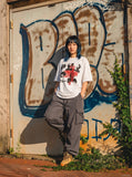 DAXUEN black oversized distressed portrait grid graphic tee — model photo