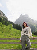 DAXUEN ecru oversized distressed portrait grid tee — model photo