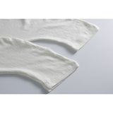 DAXUEN ecru oversized distressed portrait grid tee