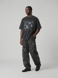 DAXUEN washed black oversized distressed portraits graphic tee — model photo