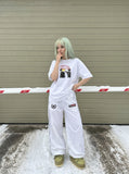 DAXUEN white oversized distressed red graphic tee — model photo