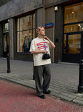 DAXUEN washed black oversized distressed stripes soldier tee — model photo