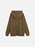 DAXUEN Distressed oversized hooded sweatshirt with rib cage graphic — model photo
