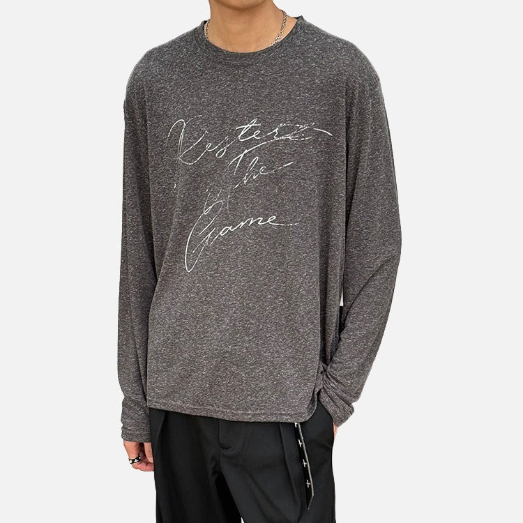 DAXUEN Distressed script long sleeve t-shirt in beige and grey — model photo