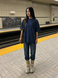 DAXUEN Distressed oversized t-shirt with star graphics — model photo