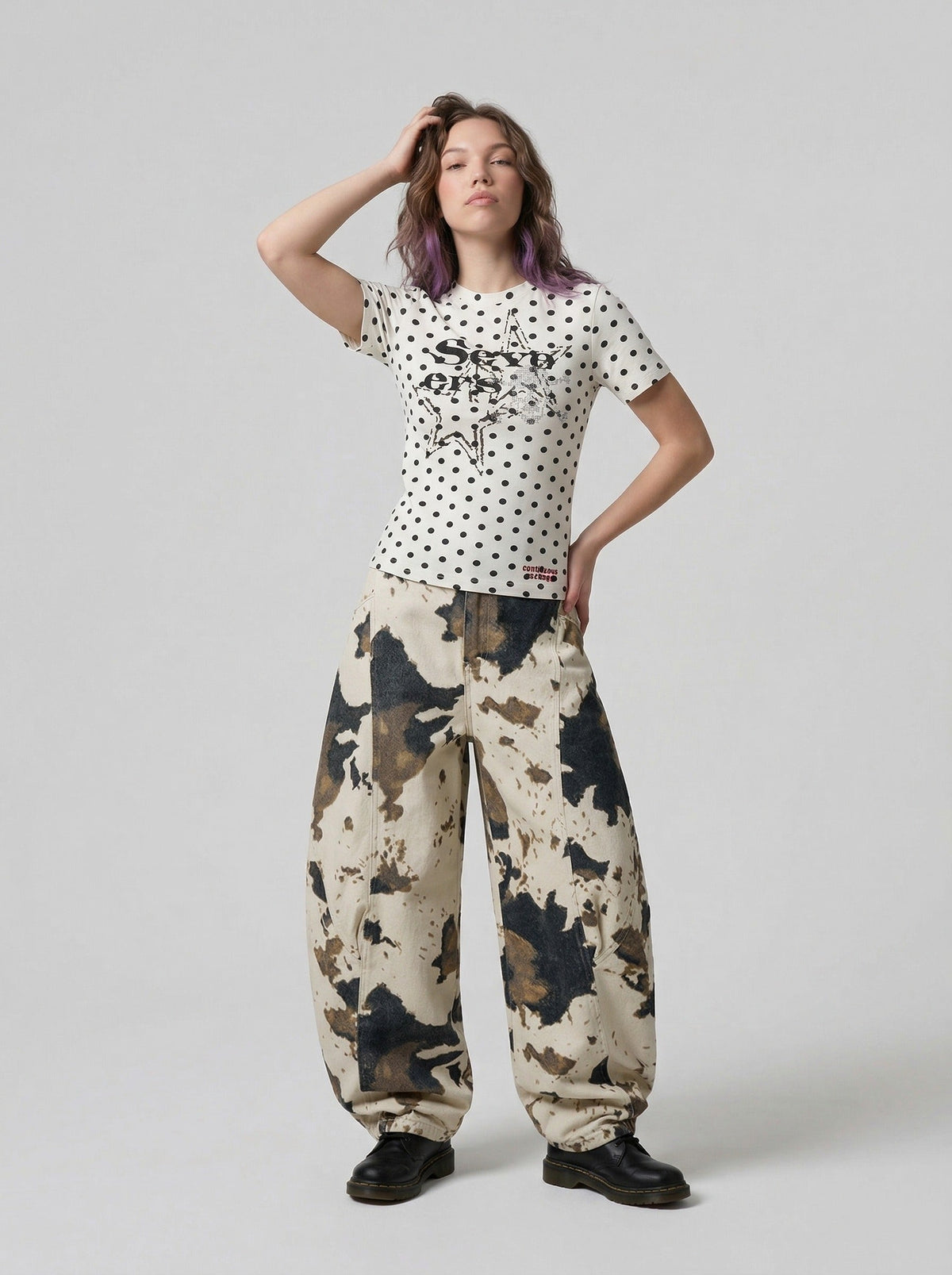DAXUEN Distressed star graphic polka dot t-shirt — model photo
