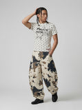 DAXUEN Distressed star graphic polka dot t-shirt — model photo