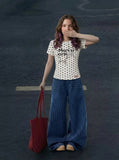 DAXUEN Distressed star graphic polka dot t-shirt — model photo