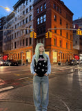 DAXUEN black raglan tee with distressed star graphics — model photo