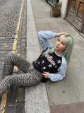 DAXUEN black raglan tee with distressed star graphics — model photo