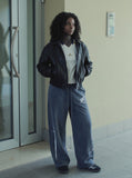 DAXUEN washed dark blue-grey wide-leg sweatpants with sword graphic — model photo