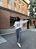 DAXUEN washed dark blue-grey wide-leg sweatpants with sword graphic — model photo