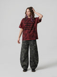 DAXUEN Distressed Text Print T-Shirt - DAXUEN — model photo