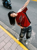 DAXUEN two-tone distressed wide-leg denim jeans — model photo