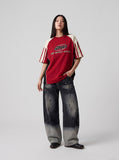 DAXUEN two-tone distressed wide-leg denim jeans — model photo