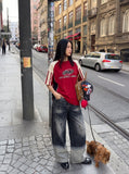 DAXUEN two-tone distressed wide-leg denim jeans — model photo