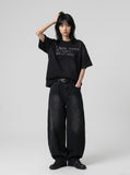 DAXUEN Distressed typewriter print short-sleeved T-shirt — model photo
