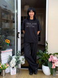 DAXUEN Distressed typewriter print short-sleeved T-shirt — model photo