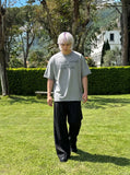 DAXUEN Distressed typewriter print short-sleeved T-shirt — model photo