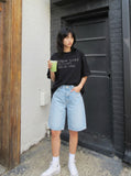 DAXUEN Distressed typewriter print short-sleeved T-shirt — model photo