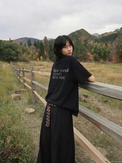 DAXUEN Distressed typewriter print short-sleeved T-shirt — model photo