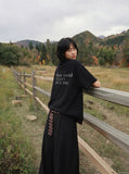 DAXUEN Distressed typewriter print short-sleeved T-shirt — model photo