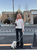 DAXUEN white long-sleeve distressed Union Jack graphic tee — model photo