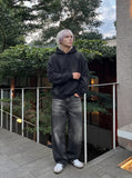DAXUEN washed black distressed vintage panel hooded sweatshirt — model photo