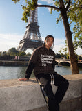 DAXUEN brown and black plaid shirt with distressed graphic — model photo