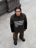 DAXUEN brown and black plaid shirt with distressed graphic — model photo