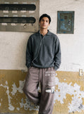 DAXUEN black distressed white graphic wide-leg sweatpants — model photo