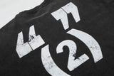 DAXUEN washed black distressed seated-figure graphic t-shirt
