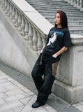 DAXUEN washed black distressed seated-figure graphic t-shirt — model photo