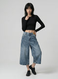 DAXUEN Women's distressed wide-leg denim culottes — model photo