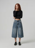 DAXUEN Women's distressed wide-leg denim culottes — model photo