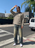 DAXUEN Distressed wide-leg denim jeans — model photo