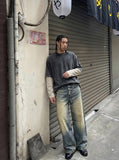 DAXUEN Distressed wide-leg denim jeans — model photo