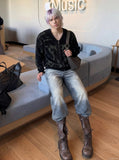DAXUEN Distressed wide-leg denim jeans with a relaxed fit — model photo