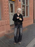 DAXUEN Distressed wide-leg denim jeans — model photo