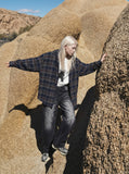 DAXUEN Distressed wide-leg denim jeans — model photo
