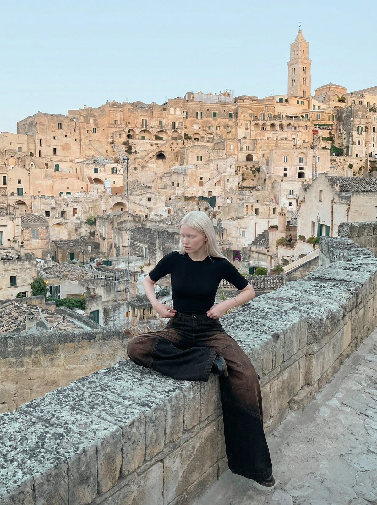 DAXUEN Distressed wide-leg denim pants — model photo