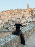 DAXUEN Distressed wide-leg denim pants — model photo