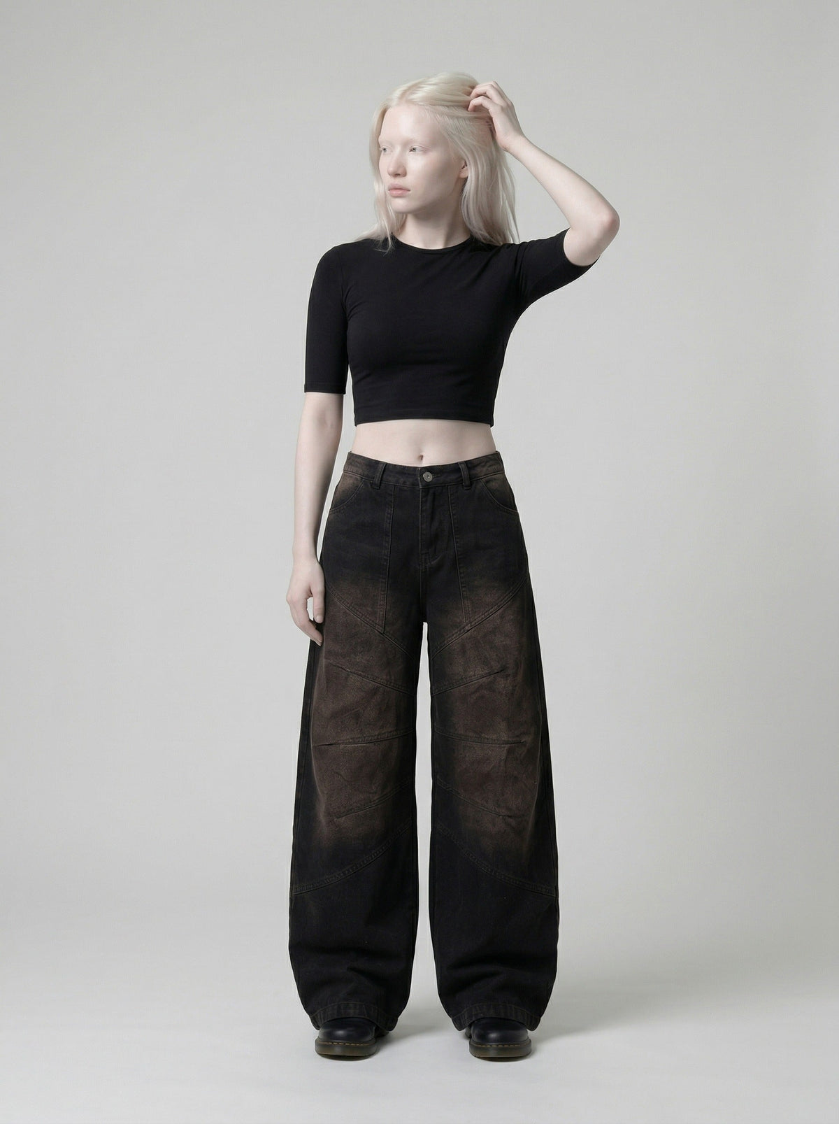 DAXUEN Distressed wide-leg denim pants — model photo