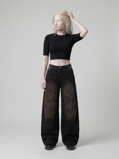 DAXUEN Distressed wide-leg denim pants — model photo